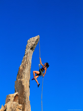 woman rock climbing